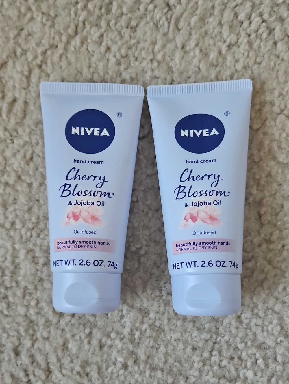 NIVEA Cherry Blossom & Jojoba Oil Hand Cream — White & Pink